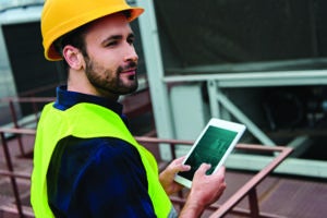Figure 1 - Worker with Tablet