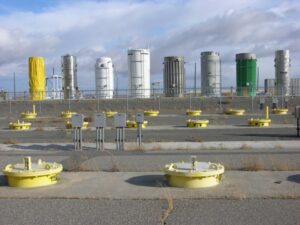 Dry storage casks and in-ground storage vaults at Idaho National Laboratory have been safely housing spent nuclear fuel for decades. Source: DOE