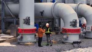A Gecko Robotics wall-climbing inspection robot in action at a power plant, showcasing the AI-driven technology at the core of NAES and Gecko’s new partnership. Courtesy: NAES/Gecko.