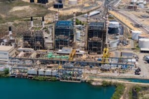 The Costa Sur Thermal Power Plant, owned and operated by the Puerto Rico Electric Power Authority (PREPA), is located in Guayanilla on the island’s southern coast. The 820-MW facility, one of Puerto Rico’s largest fossil-fueled power stations, uses dual-fuel steam units and includes black start-capable gas turbines. It plays a central role in maintaining grid reliability during emergencies. In May 2025, PREPA restored Unit 5 to service following months of outage, adding 350 MW of dispatchable capacity ahead of the summer peak.